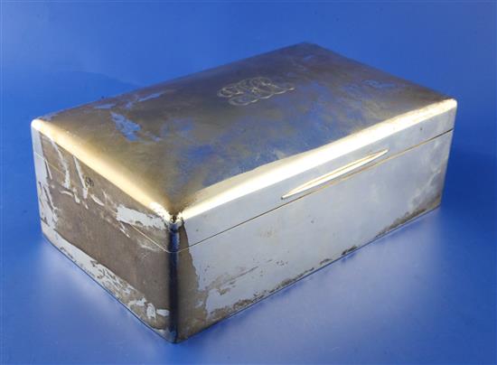 An Edwardian silver rectangular cigar/cigarette box, 9in.